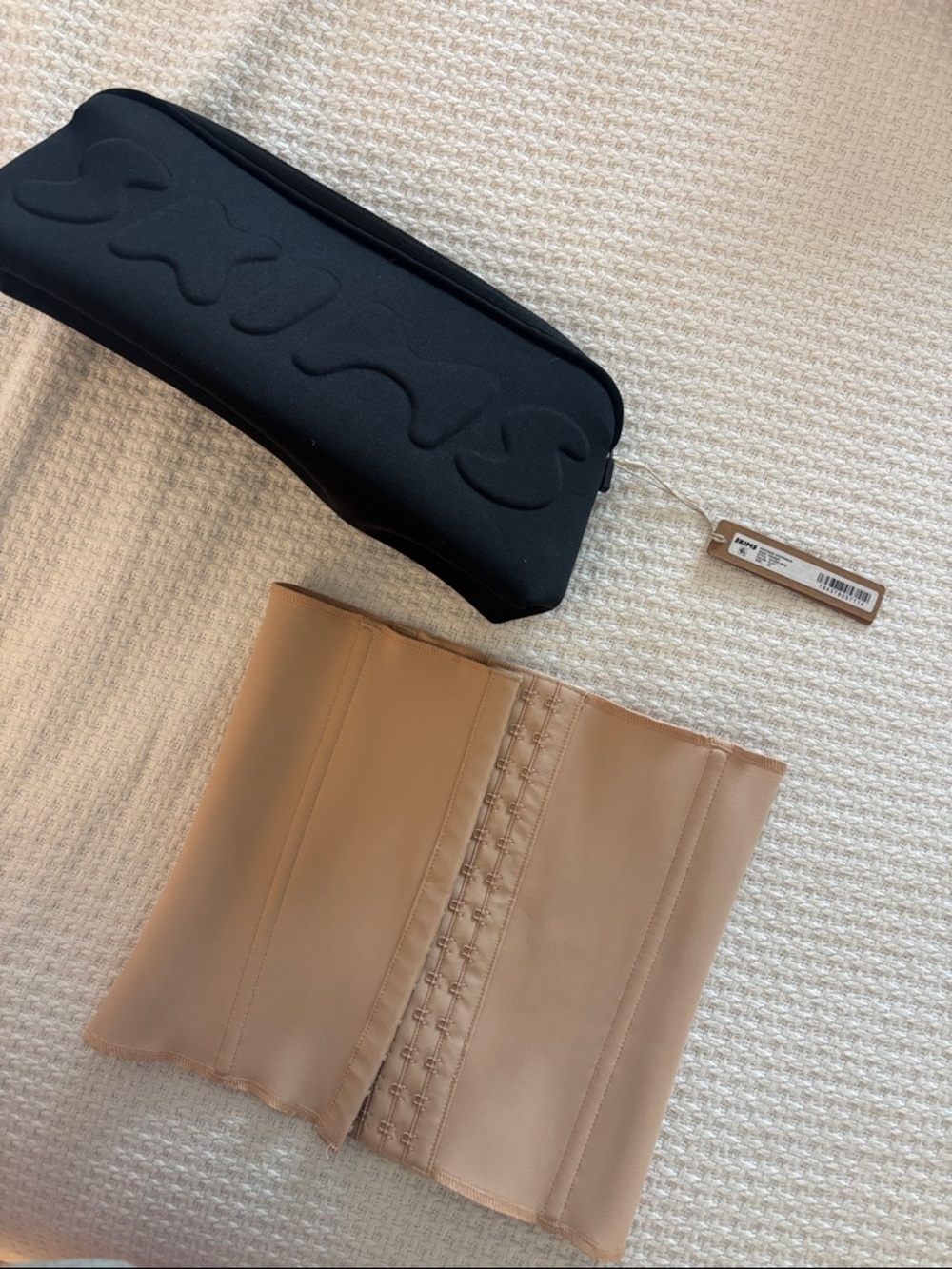 SKIMS Waist Trainer Shapewear in Clay with SKIMS Black Storage Pouch